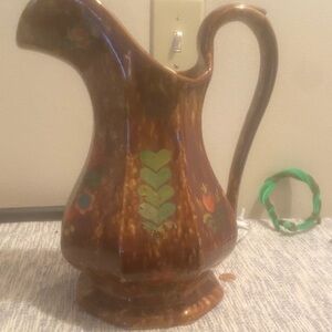Vintage Brown Ceramic Pitcher with Floral Design
